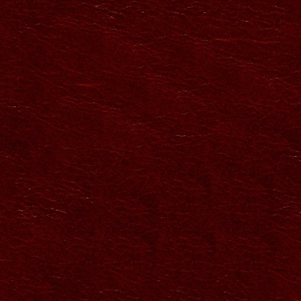 上漆的深红色高品质皮革背景在宏。图片下载