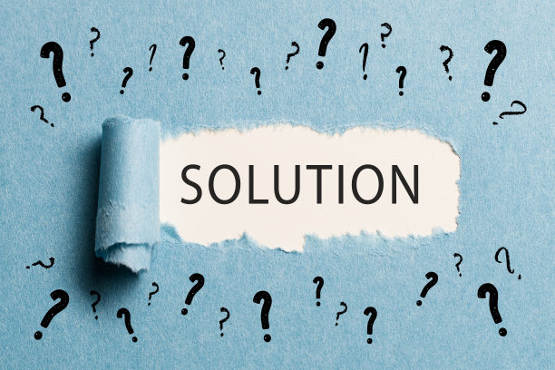 撕破的纸上写着“解决方案”图片下载