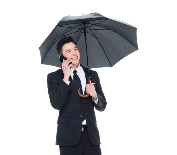 英俊的商人拿着一把伞图片下载
