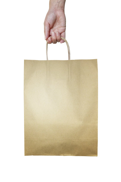 孤立的女人手里拿着一个购物袋图片下载