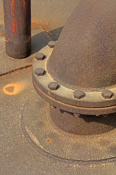 在工厂里氧化金属零件接头，特写照片图片下载