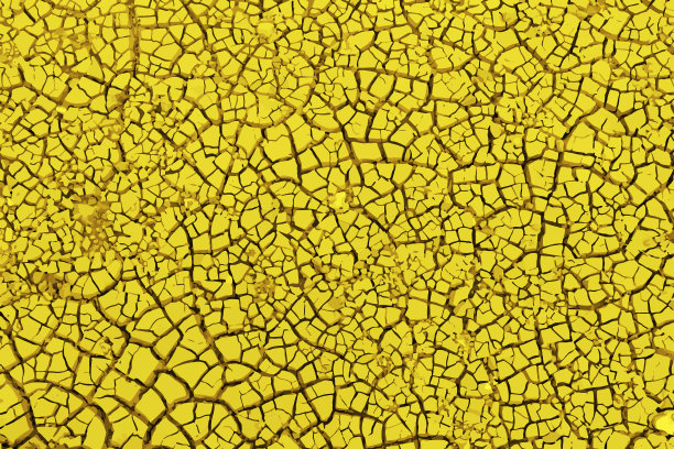 抽象的黄色背景。土壤的裂缝。文本的空白。图片下载