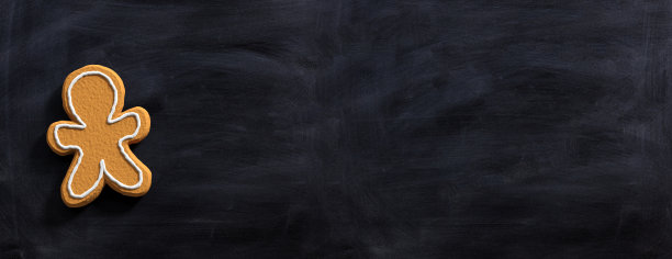 人形状的姜饼，俯视图，黑板，横幅。图片下载