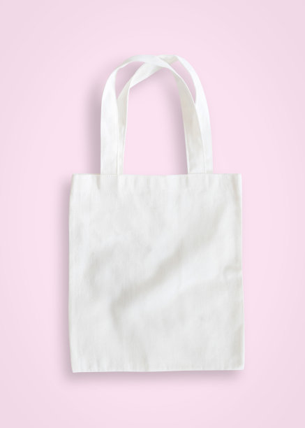大手提袋模拟帆布织物布购物袋在粉红色的背景孤立与剪切路径图片下载