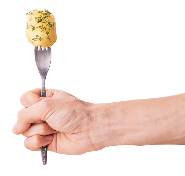 手里拿着一把叉子，上面放着小茴香煮土豆图片下载