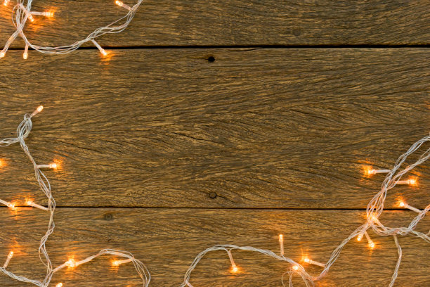 近距离特写复古陈年黄色和棕色调木纹横向背景纹理与LED灯装饰设计作为展示，推广产品，照片蒙太奇，横幅，广告的概念图片下载