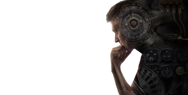 一个有思想的人的剪影背景上的工业机械。工业、技术、科学等方面的概念背景。复古的朋克风格。图片下载