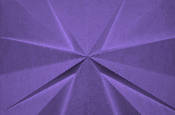 从折叠的纸抽象交叉。图片下载