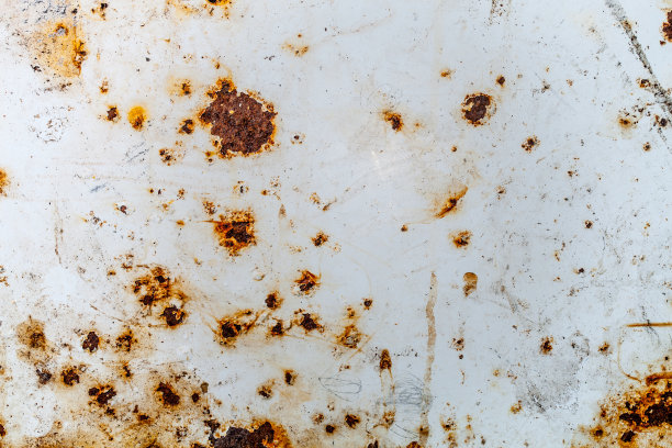 明亮的锈渍，纹理漆，从下面显露出锈迹图片下载