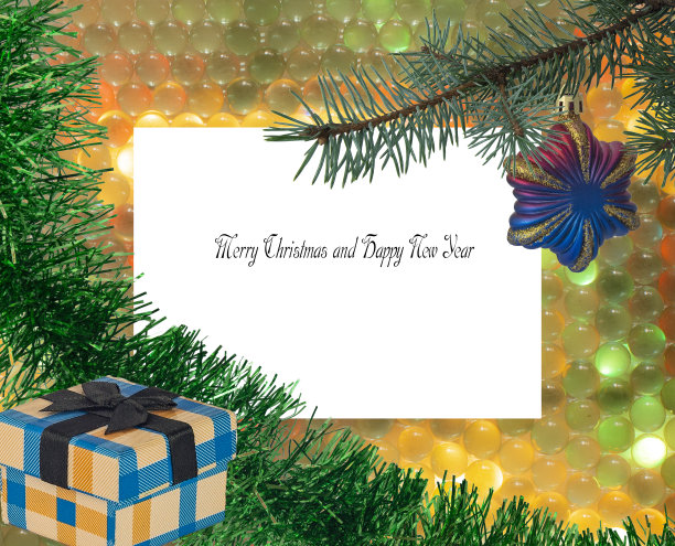 圣诞玩具以贝壳的形式放在圣诞树上的金丝礼物盒上，以抽象的背景图片下载