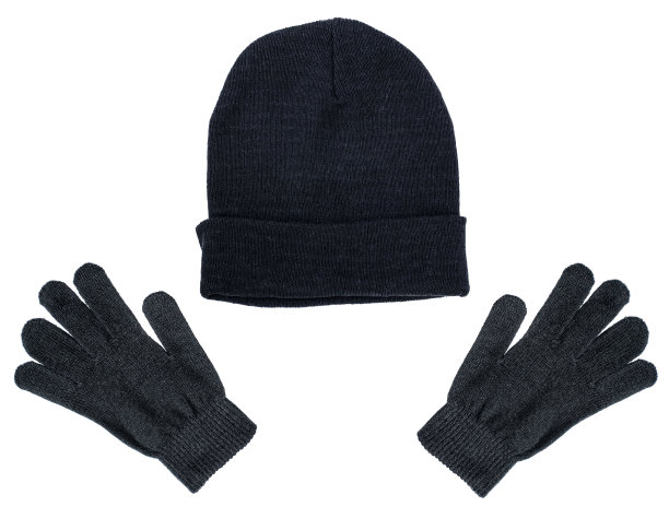 黑色针织男子帽子无檐帽和手套在一个白色的背景图片下载