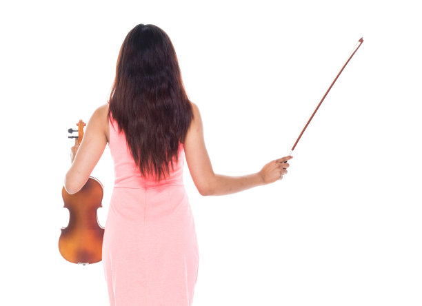 后视图美丽的女性拉小提琴图片下载