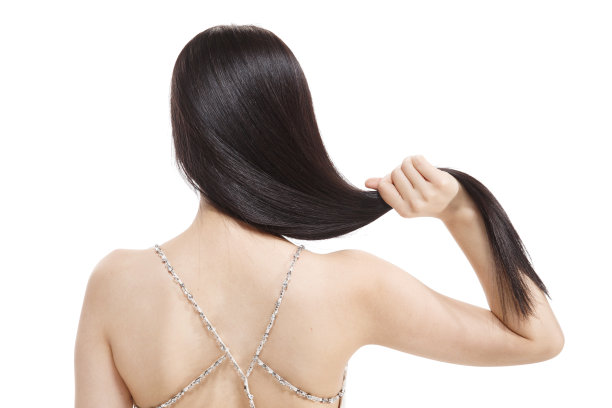 青年女人亮丽丝缎般的头发图片下载