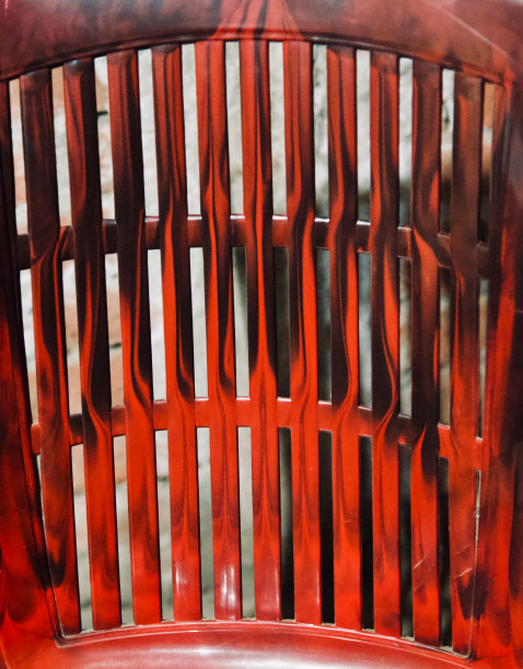 孤立的红色塑料椅子独特的照片图片下载