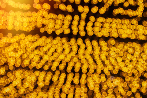 Marquee灯光模糊了城市街道的背景图片下载