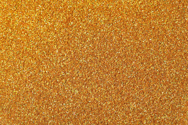 金色的闪光质感。金色闪光背景的高分辨率照片。图片下载
