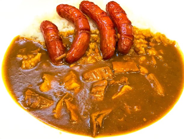 咖喱猪肉块配香肠和米饭图片下载