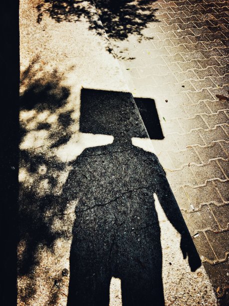 我的影子方形的头在人行道上图片下载