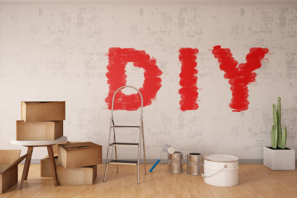 家居概念。DIY在墙上画画图片下载