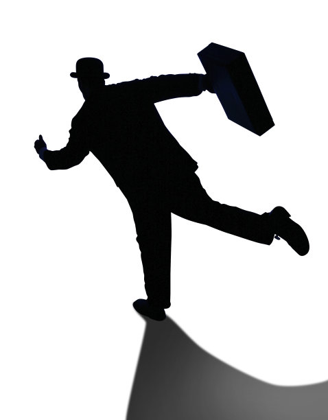 商人跑步与公文包的轮廓在白色图片下载