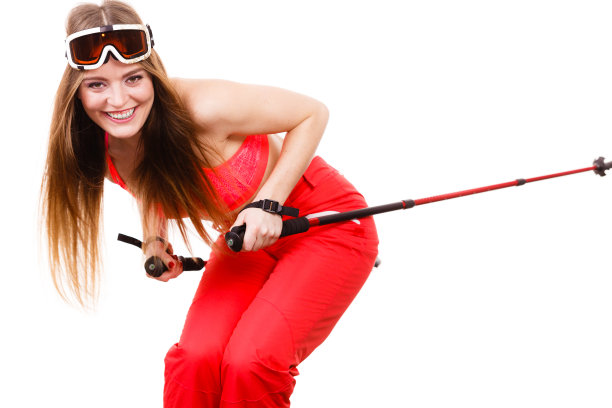 准备骑女人穿着滑雪服拿着杆子图片下载