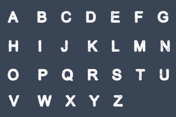 字母文字用白粉笔写在黑板上。图片下载