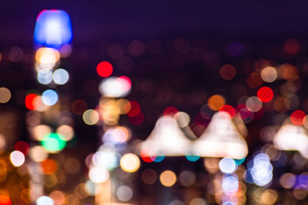 散焦空中夜景的旧金山金融区;七彩灯光背景散景;抽象的背景图片下载
