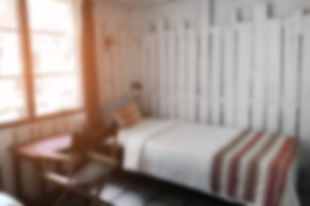 抽象模糊的小卧室为背景。图片下载