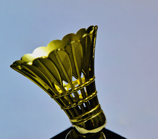 金色金属人造羽毛球软木照片图片下载