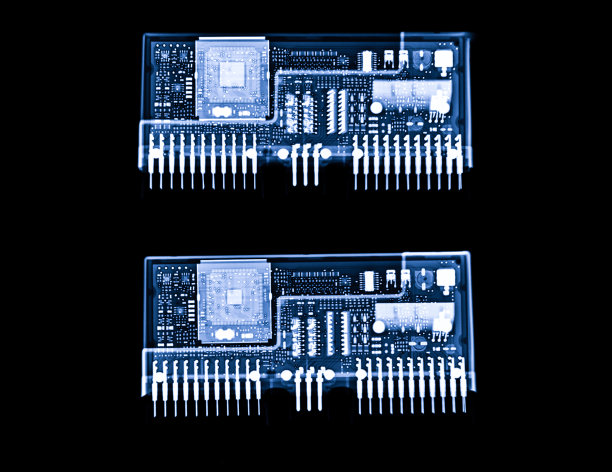 摩托车发动机控制单元或ECU的x射线图像。图片下载