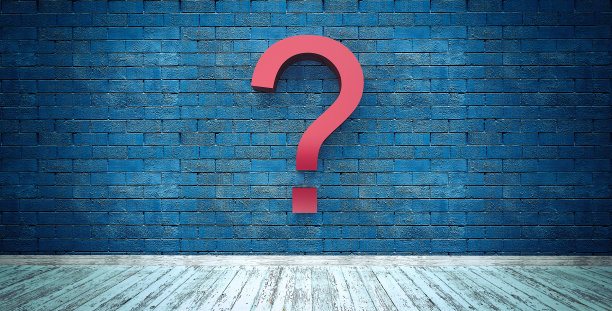 蓝色砖墙上的问号符号图片下载