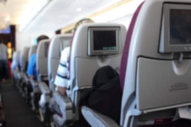 飞机内部和座位的模糊背景图片下载