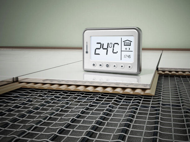 地板采暖系统安装热表显示理想的室温素材图片