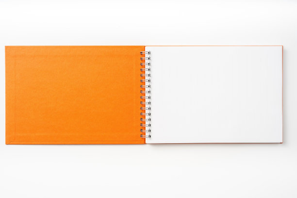 螺旋橙色笔记本与打开的封面图片下载