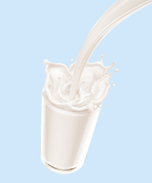 把牛奶倒在杯子里。图片下载