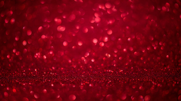 红色的Bokeh形状的母亲节黑暗背景与明亮的闪闪发光的灯情人节，3月8日或妇女节。影棚拍摄图片下载