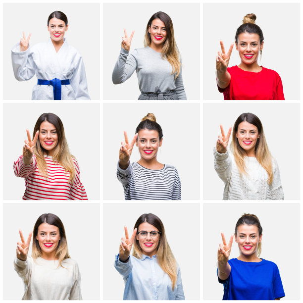 年轻美丽的女子在孤立的背景显示和指向第二手指，同时自信和快乐的微笑。图片下载