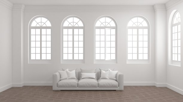 室内白色墙壁，木地板，拱形窗户和沙发。图片下载