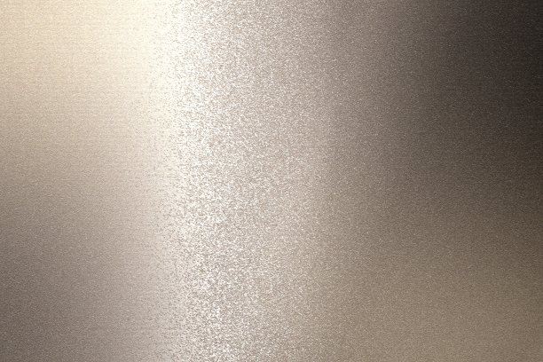 光线照射在粗糙的深色铜金属墙面纹理上，抽象的背景图片下载