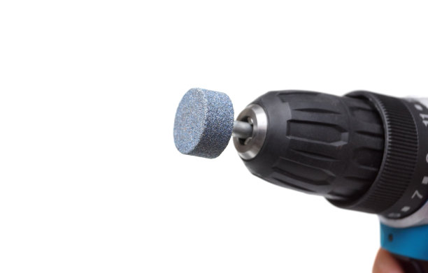 一个带有砂轮钻头的螺丝刀图片下载