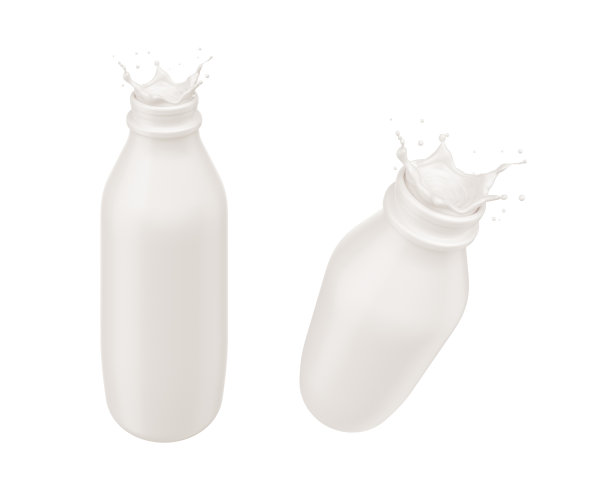 带喷溅的奶瓶。图片下载