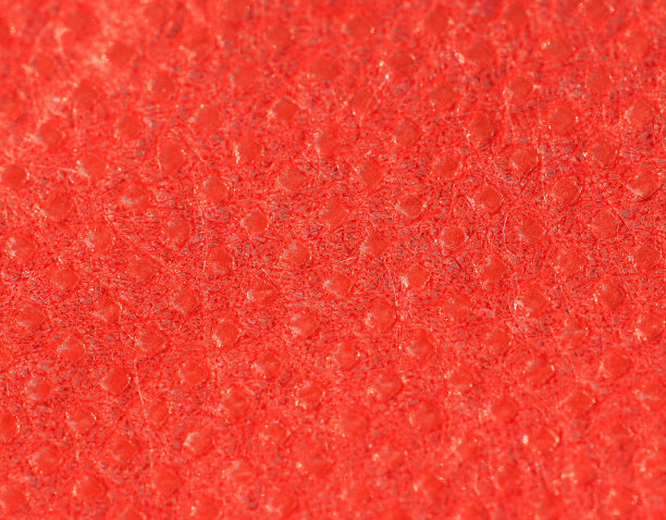 红色非织造丙纶织物纹理背景图片下载