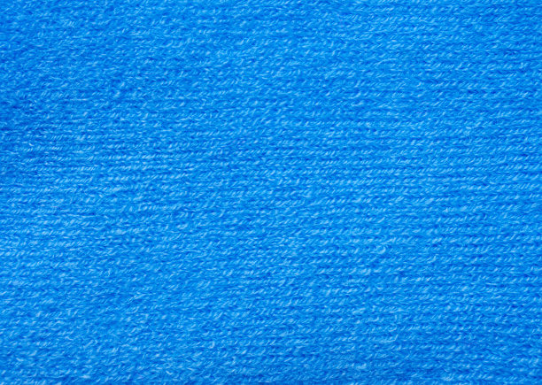 蓝色针织物质地。特写镜头,背景图像。图片下载