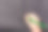 一个小男孩的手在黑色的背景上用铅笔写字图片下载