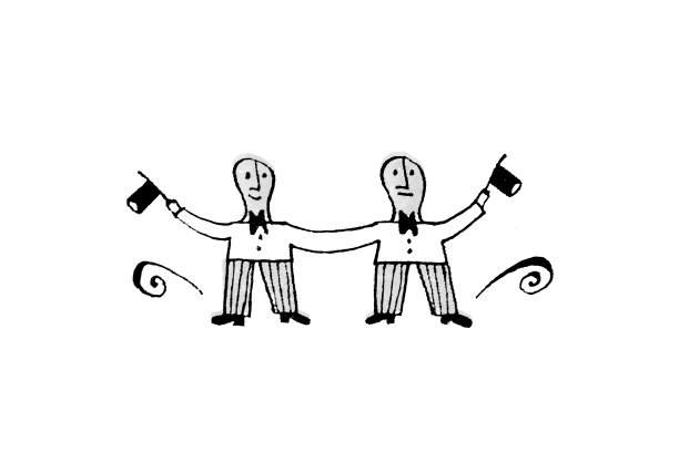 连体双胞胎手拉手。素材图片