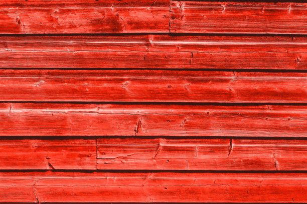 木制背景与红色破旧的老式板。水平木板的木墙。图片下载
