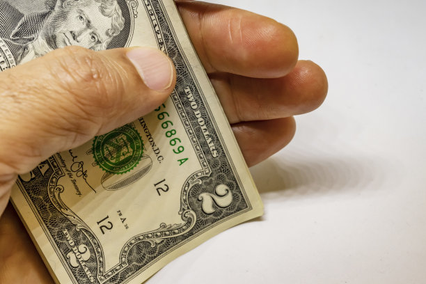 一堆钞票美元是世界贸易和经济体系的一部分图片下载