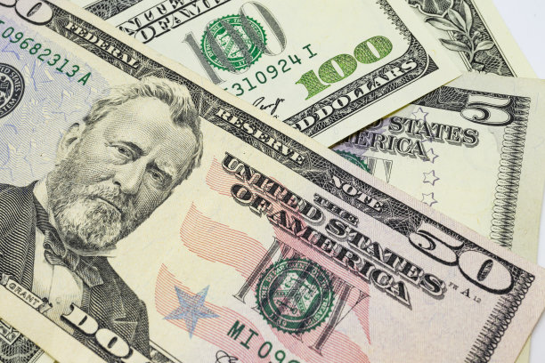 一堆钞票美元是世界贸易和经济体系的一部分图片下载