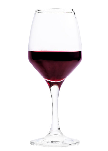 白色背景上的一杯葡萄酒。半杯。隔离。半空的玻璃图片下载