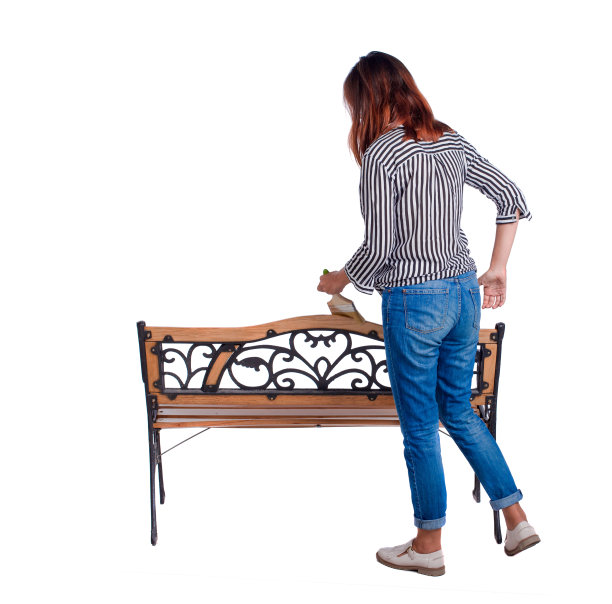 一个女人在长凳上的背影。图片下载